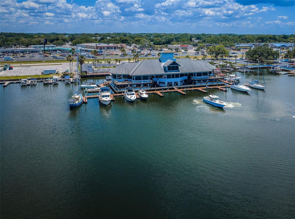5157 Silent Loop, Unit 301 New Port Richey, FL 34652 - Photo 42 of 71 an aerial view of residential houses with outdoor space