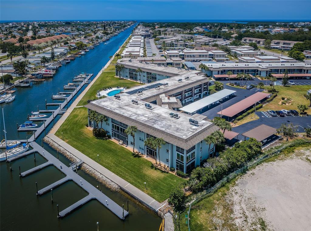 5157 Silent Loop, Unit 301 New Port Richey, FL 34652 - Photo 55 of 71 an aerial view of a house with a garden