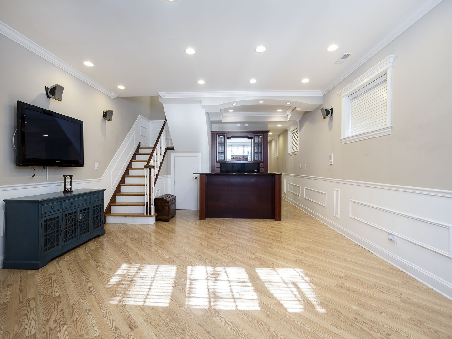 910 West Roscoe Street, Unit 1 Chicago, IL 60657 - Photo 12 of 13 a view of a livingroom with wooden floor and furniture