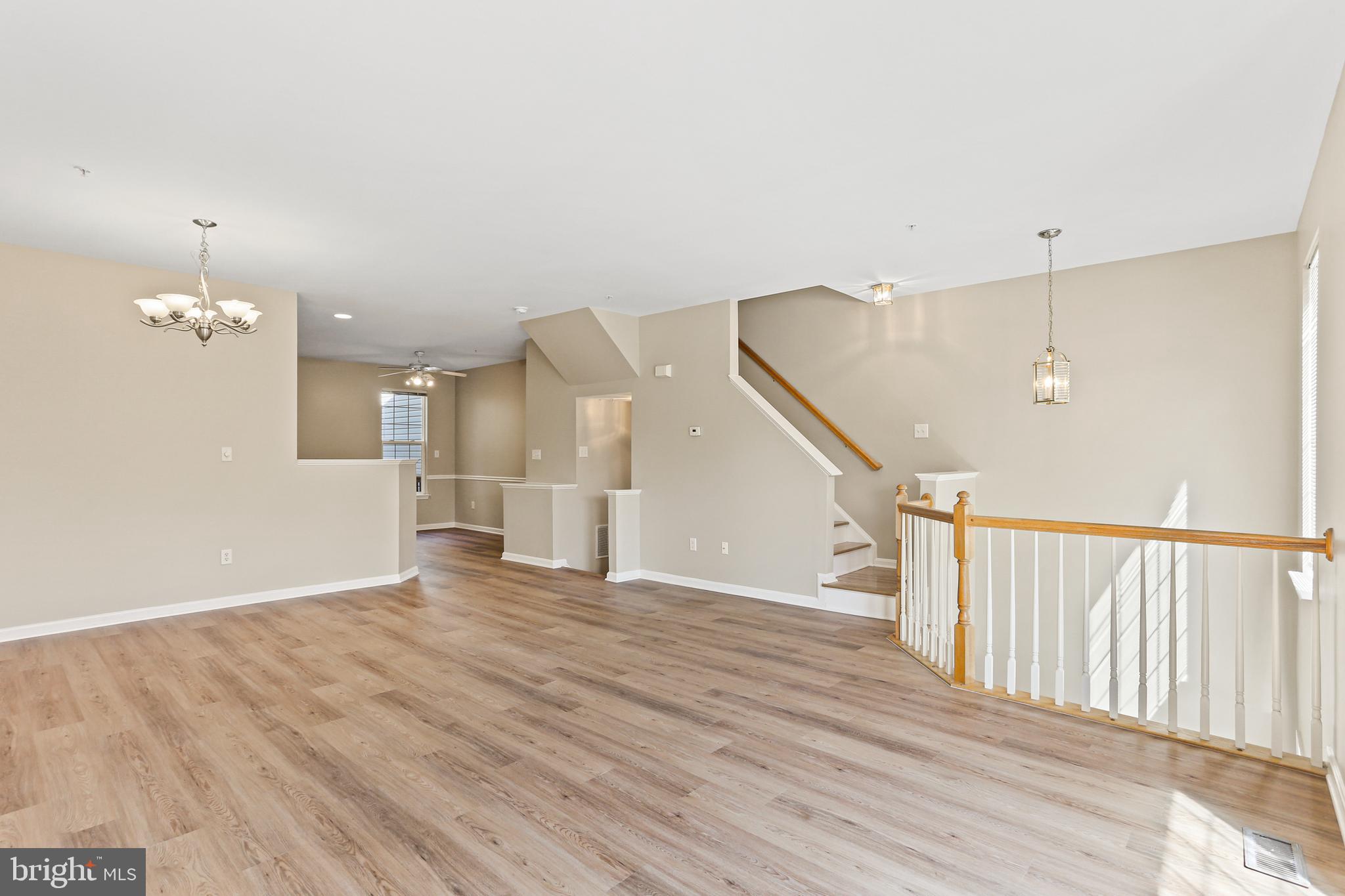 804 Patuxent Run Circle Odenton, MD 21113 - Photo 6 of 29 a view of empty room with wooden floor