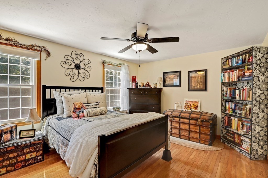 10 Quail Run Road Bellingham, MA 02019 - Photo 23 of 40 a bedroom with a bed and dresser