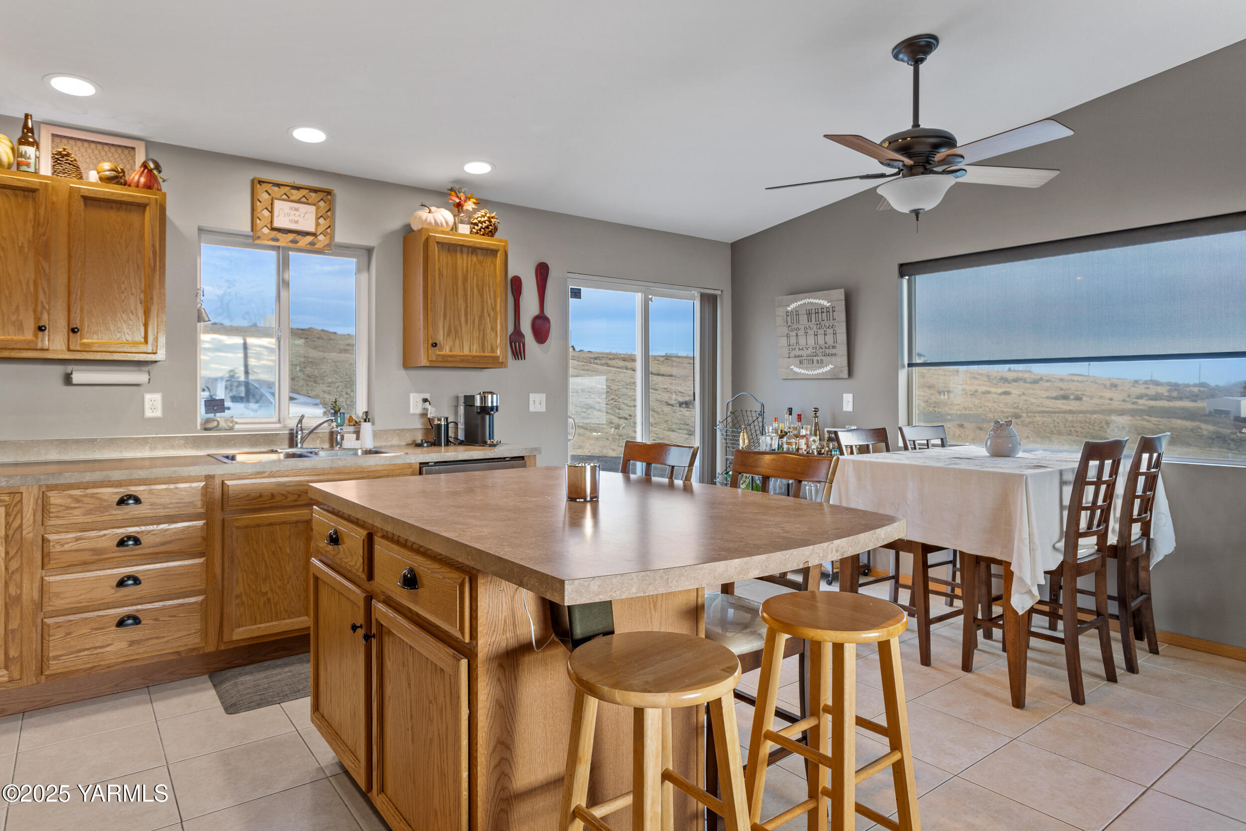 150 Solar Lane Yakima, WA 98901 - Photo 12 of 27 a large kitchen with a table and chairs