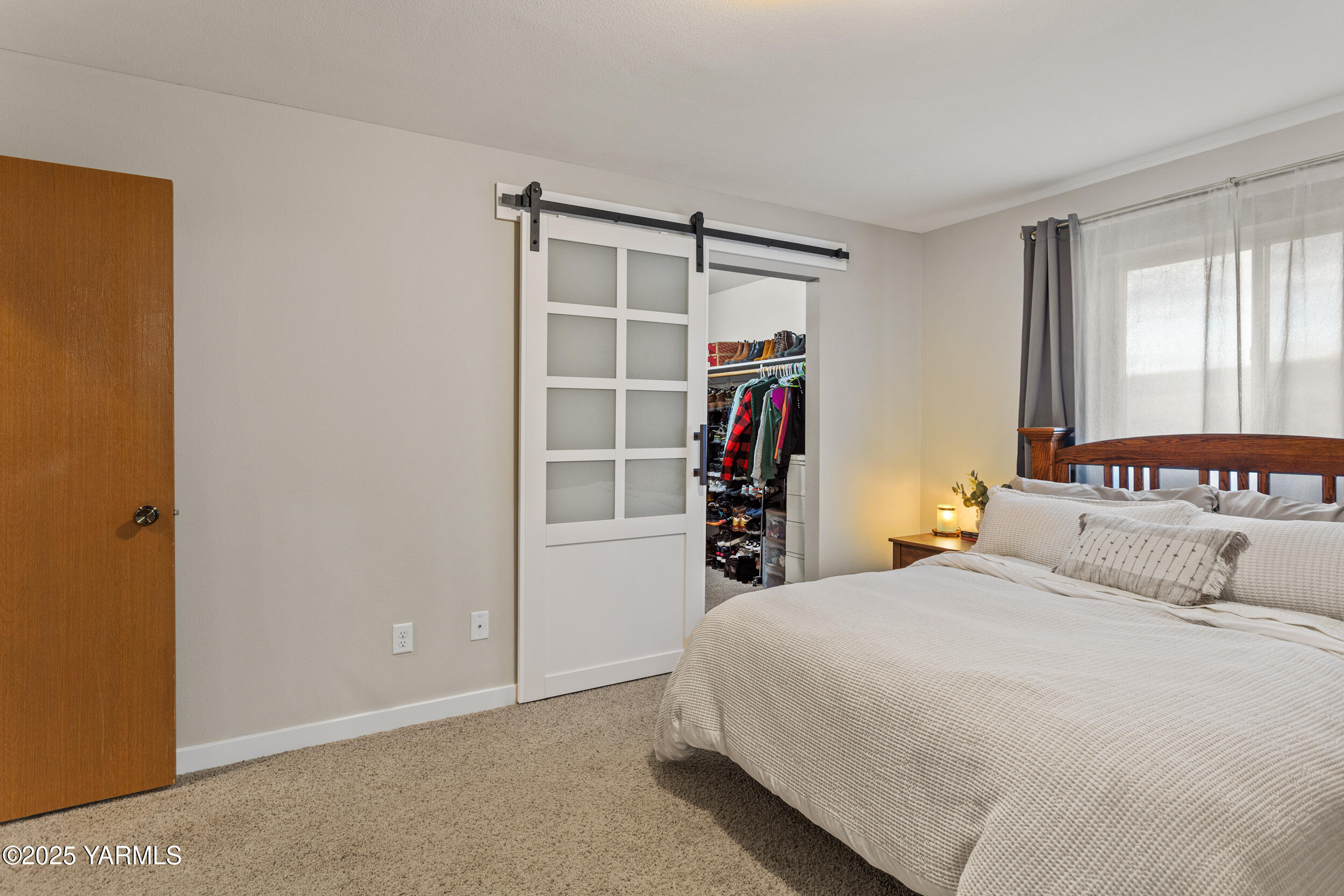 150 Solar Lane Yakima, WA 98901 - Photo 7 of 27 a bedroom with a bed and a closet