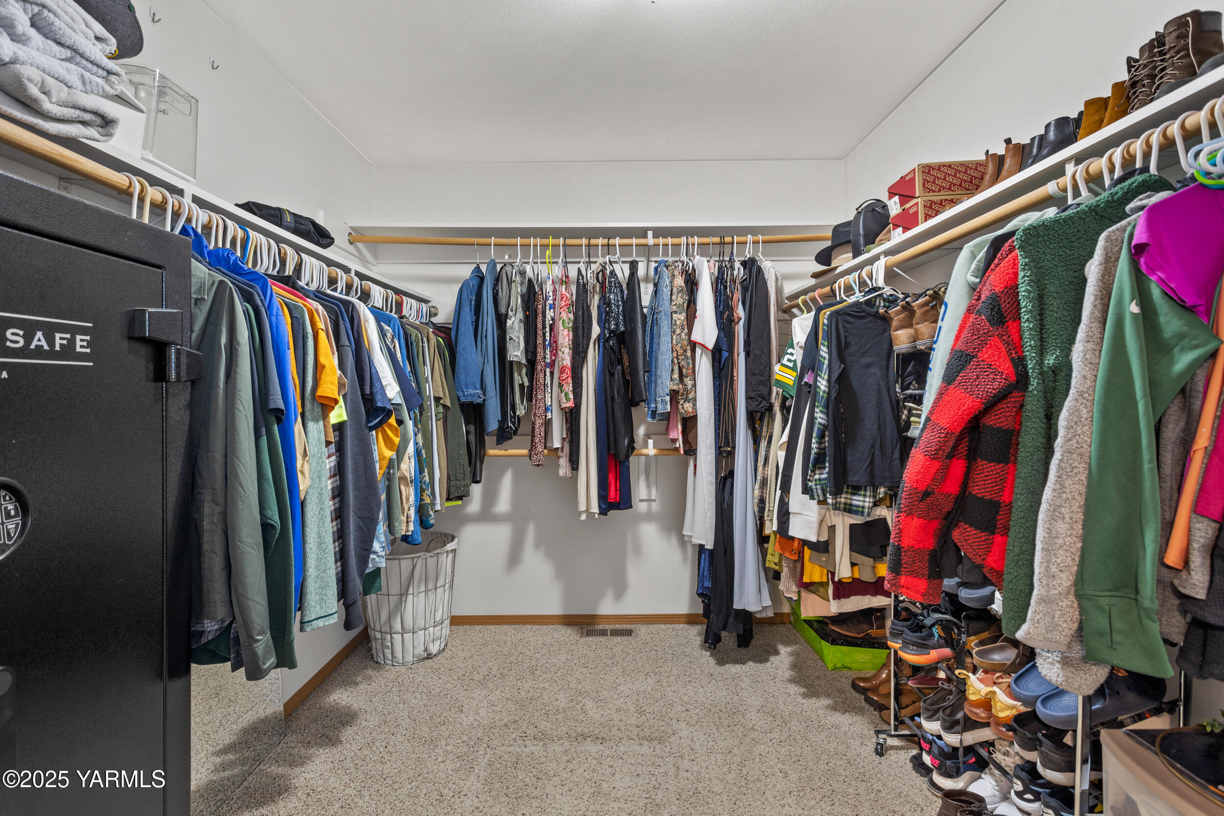 150 Solar Lane Yakima, WA 98901 - Photo 10 of 27 a view of walk in closet with clothes