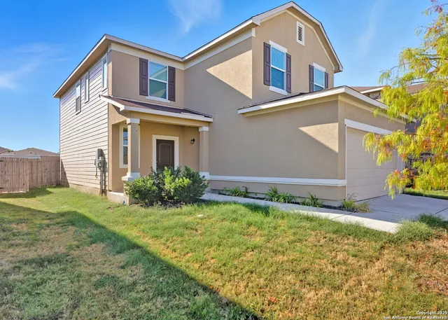 a front view of house with yard