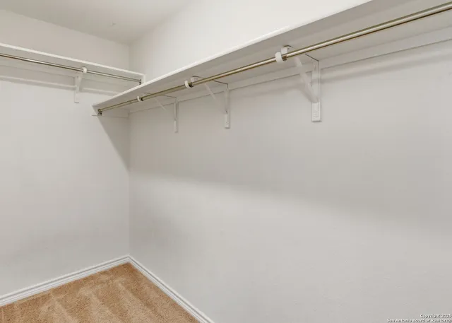 a view of a room with racks on the wall