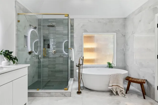 a room with a sink and a mirror