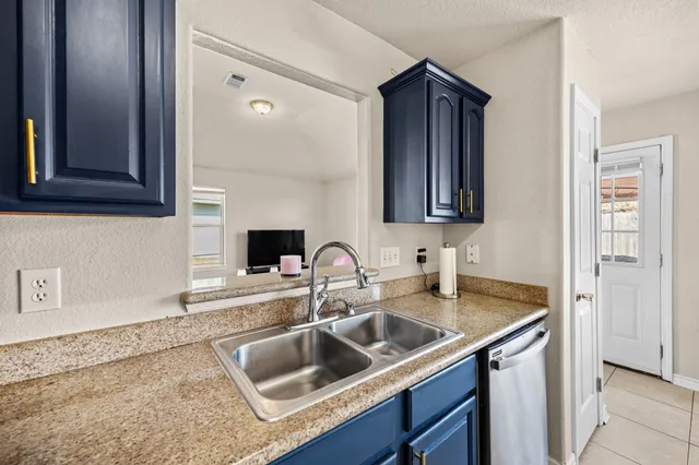 a view of a dining room kitchen and furniture