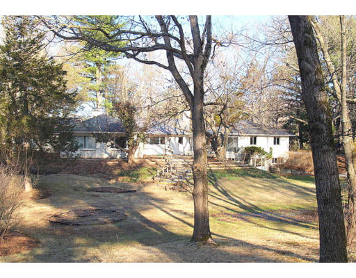 69 Silver Hill Road Lincoln, MA 01773 - Photo 1 of 9 a view of a yard and front view of a house
