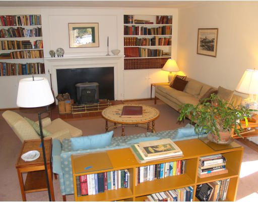69 Silver Hill Road Lincoln, MA 01773 - Photo 2 of 9 a living room with furniture a rug and a fireplace
