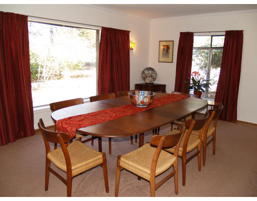 69 Silver Hill Road Lincoln, MA 01773 - Photo 3 of 9 a view of a dining room with furniture and wooden floor