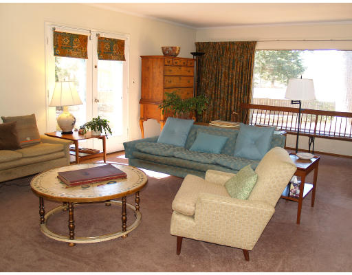 69 Silver Hill Road Lincoln, MA 01773 - Photo 7 of 9 a living room with furniture and a floor to ceiling window