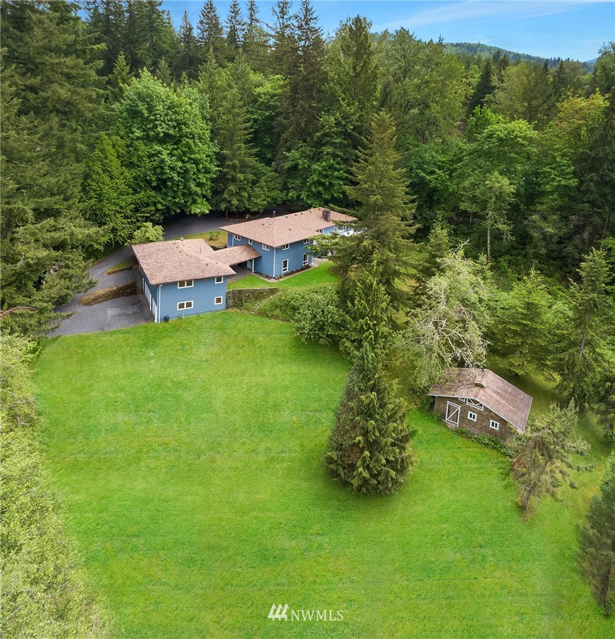 27819 Southeast Issaquah-Fall City Road Fall City, WA 98024 - Photo 1 of 39 an aerial view of a house with a yard