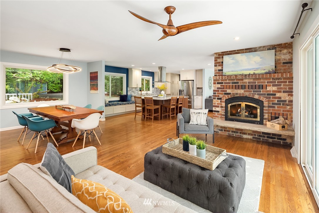 27819 Southeast Issaquah-Fall City Road Fall City, WA 98024 - Photo 11 of 39 a living room with furniture and a fireplace