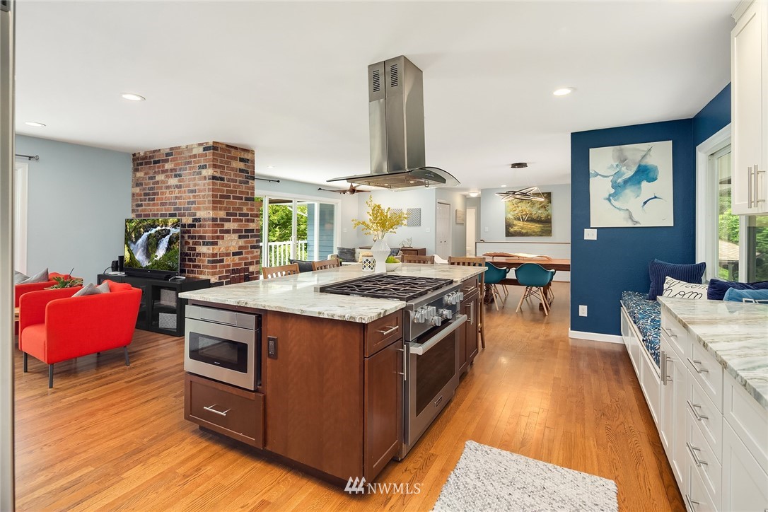 27819 Southeast Issaquah-Fall City Road Fall City, WA 98024 - Photo 14 of 39 a kitchen with stainless steel appliances granite countertop a stove and a sink