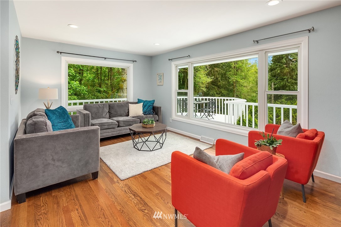 27819 Southeast Issaquah-Fall City Road Fall City, WA 98024 - Photo 16 of 39 a living room with furniture and a window