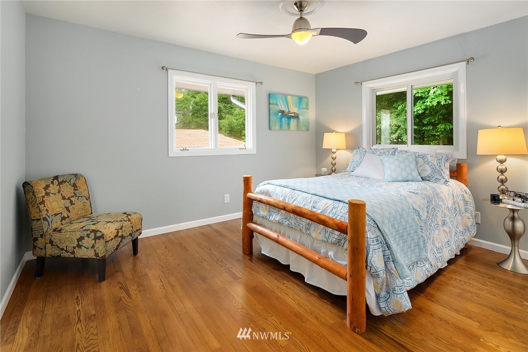 27819 Southeast Issaquah-Fall City Road Fall City, WA 98024 - Photo 18 of 39 a bedroom with a bed and a window