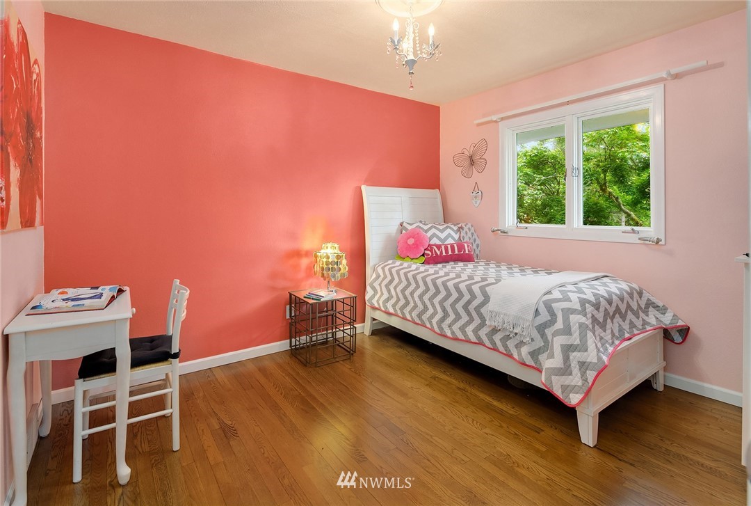 27819 Southeast Issaquah-Fall City Road Fall City, WA 98024 - Photo 20 of 39 a bedroom with a bed and a desk