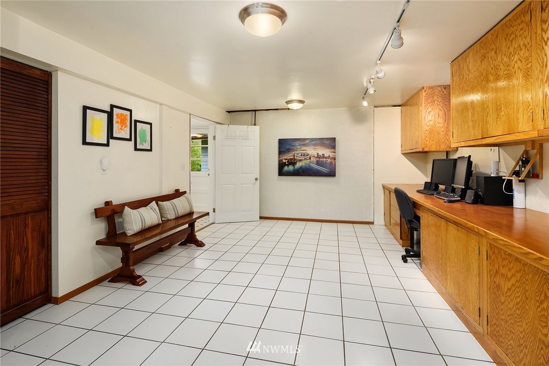 27819 Southeast Issaquah-Fall City Road Fall City, WA 98024 - Photo 30 of 39 a room with lots of white furniture and a window