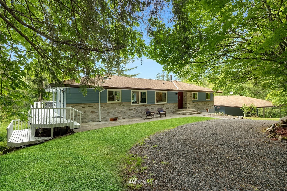 27819 Southeast Issaquah-Fall City Road Fall City, WA 98024 - Photo 4 of 39 a front view of a house with garden