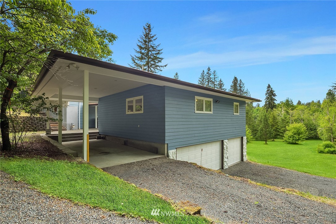 27819 Southeast Issaquah-Fall City Road Fall City, WA 98024 - Photo 5 of 39 front view of a house with a yard