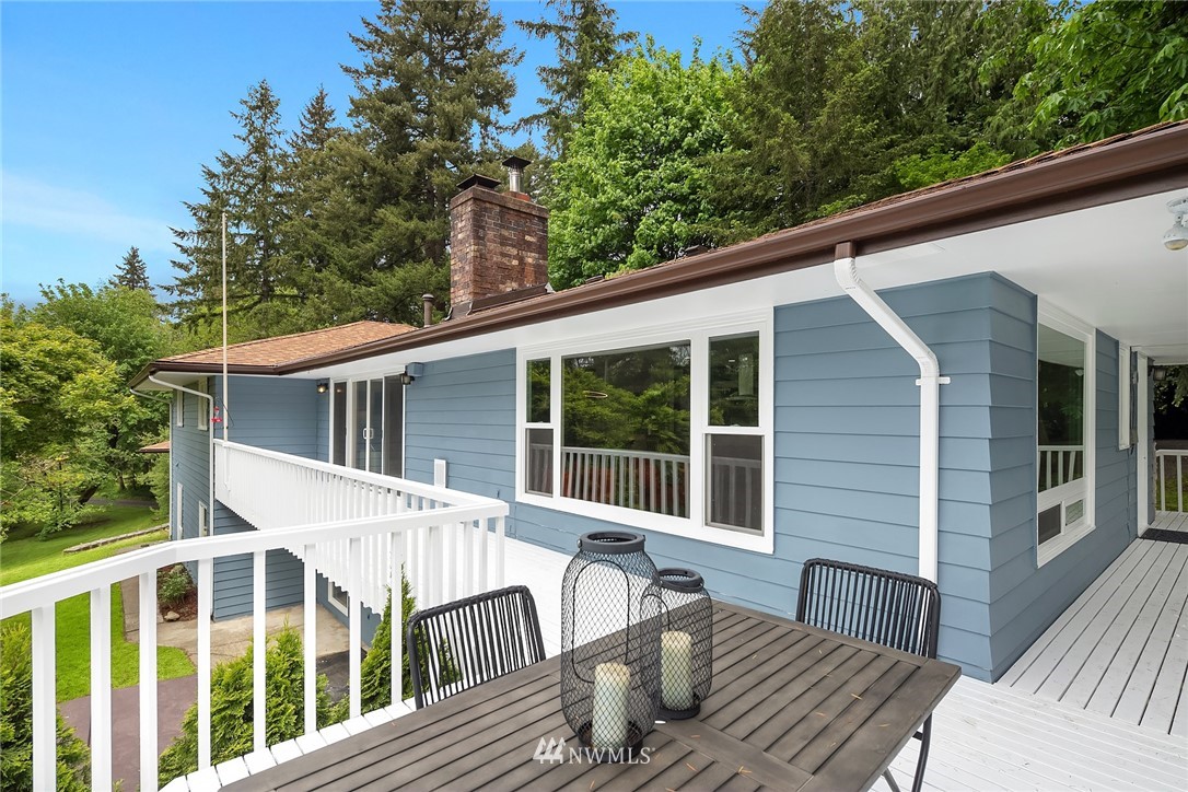 27819 Southeast Issaquah-Fall City Road Fall City, WA 98024 - Photo 6 of 39 a view of a house with a deck and wooden floor
