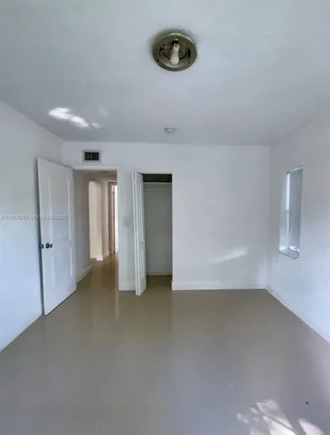 a view of backyard with green space