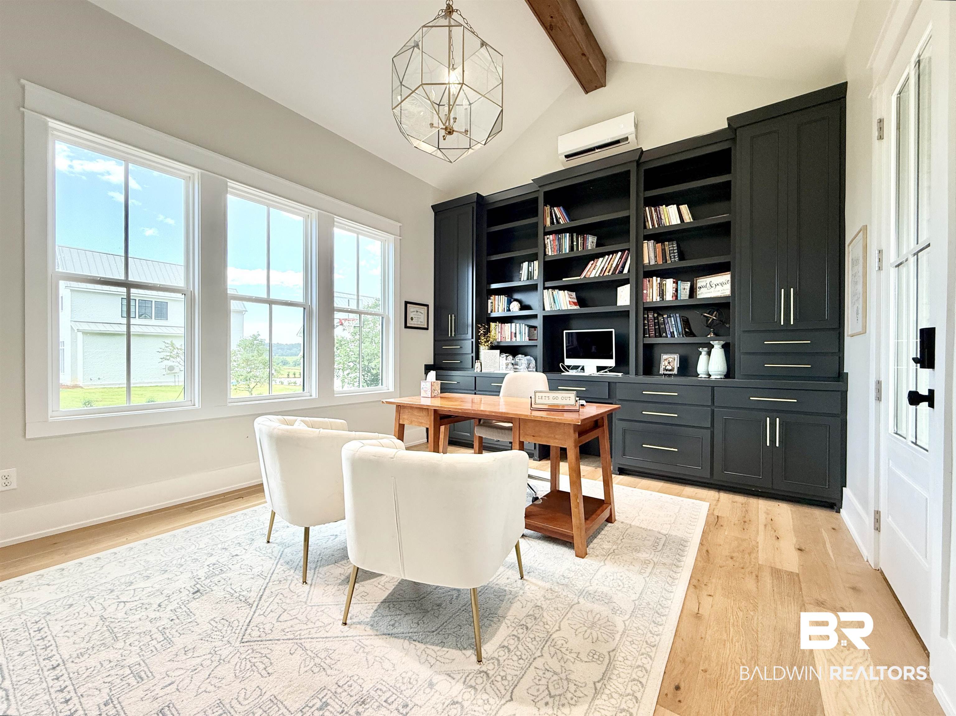 21767 Gallery Boulevard Fairhope, AL 36532 - Photo 55 of 74 Office area with light wood-style floors, a chandelier, and a wall mounted AC