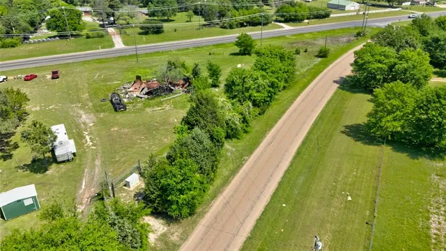 a view of a lake with a yard