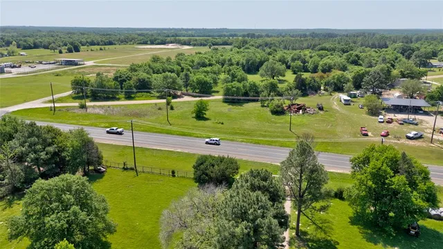 a view of a golf course with a lake view