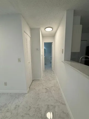 a view of a room with a sink and a vanity
