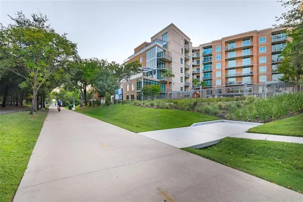 a view of a building with a yard