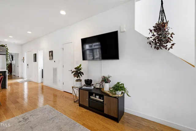 a bathroom with a sink a mirror and a window