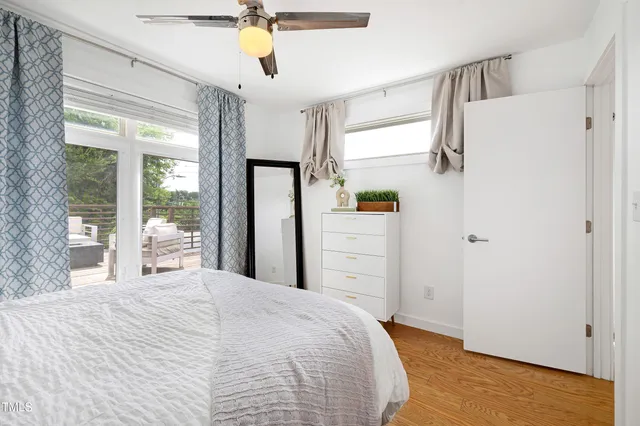 a view of a bathroom from a hallway
