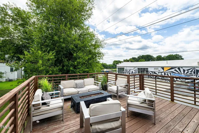 a view of a roof deck with couches