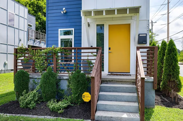 a view of a chairs and table in a patio