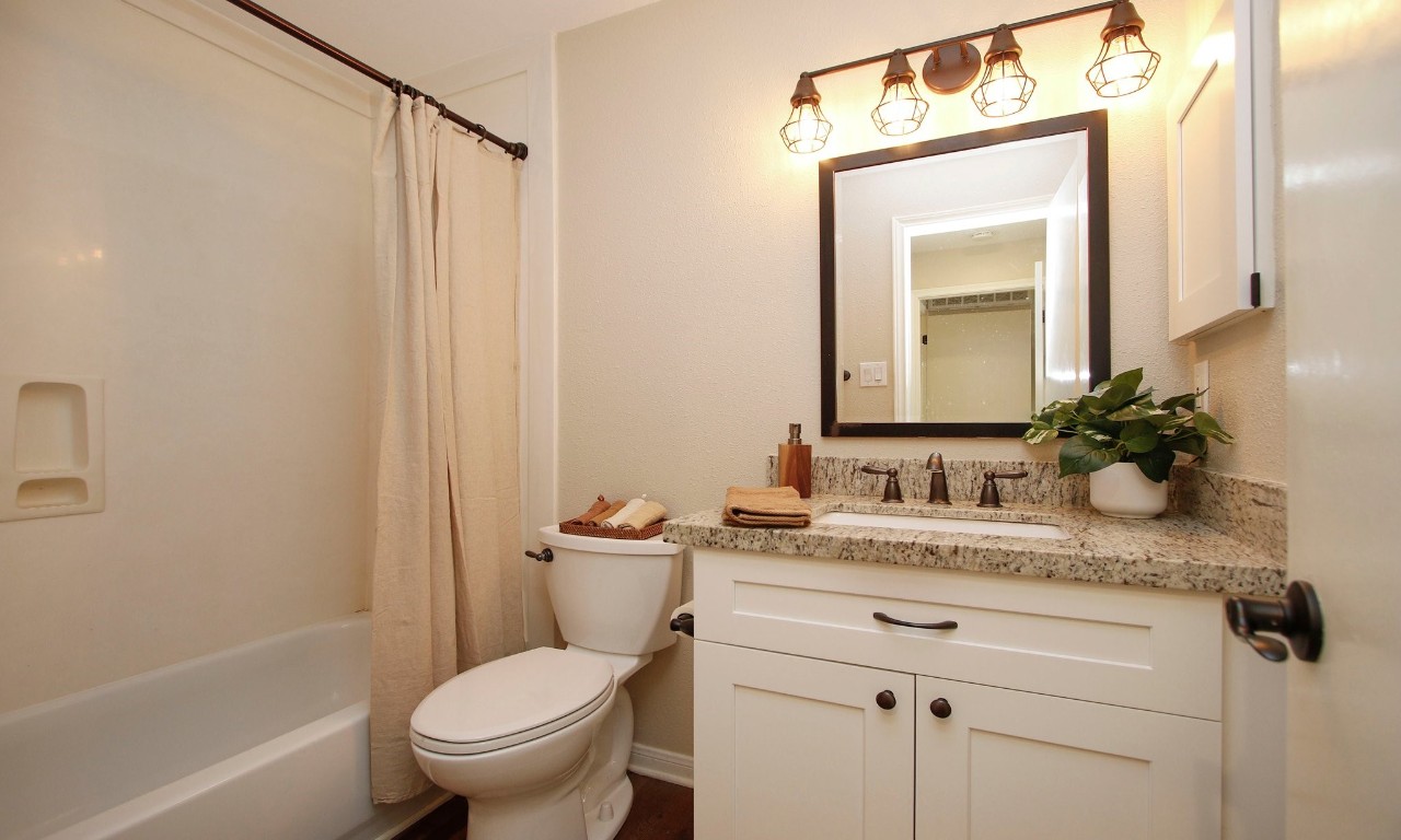 3500 Tangle Brush Drive, Unit 138 Spring, TX 77381 - Photo 15 of 28 The full bath offers an updated shaker-style vanity with granite counters along with a combination shower/tub.