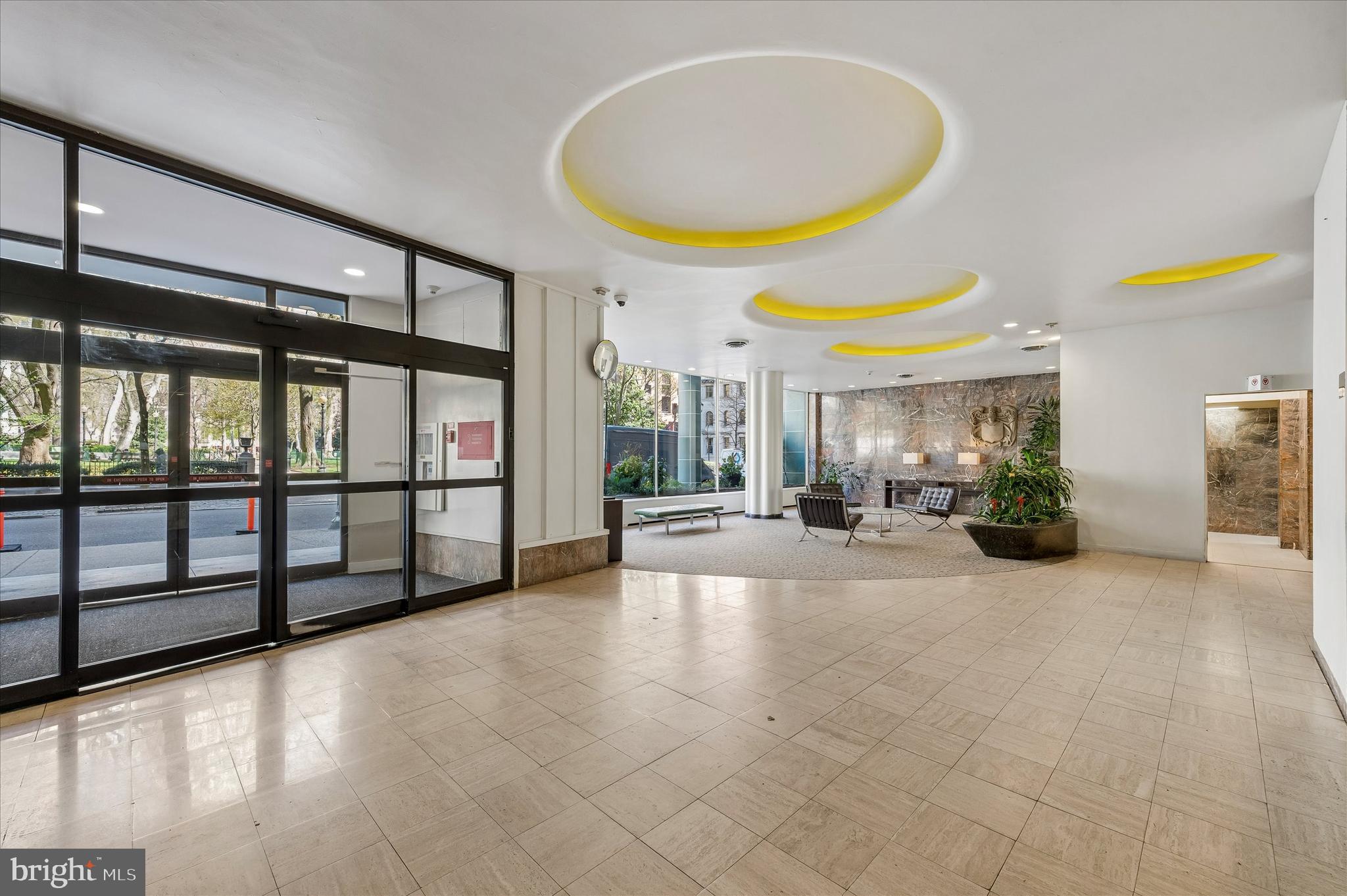 1810 Rittenhouse Square, Unit 2007 Philadelphia, PA 19103 - Photo 2 of 25 a view of a bathroom with furniture and a large window