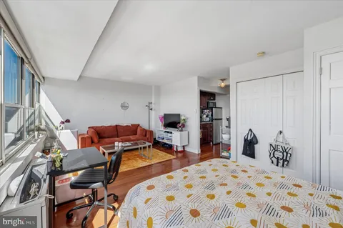 a bed room with a bed and furniture