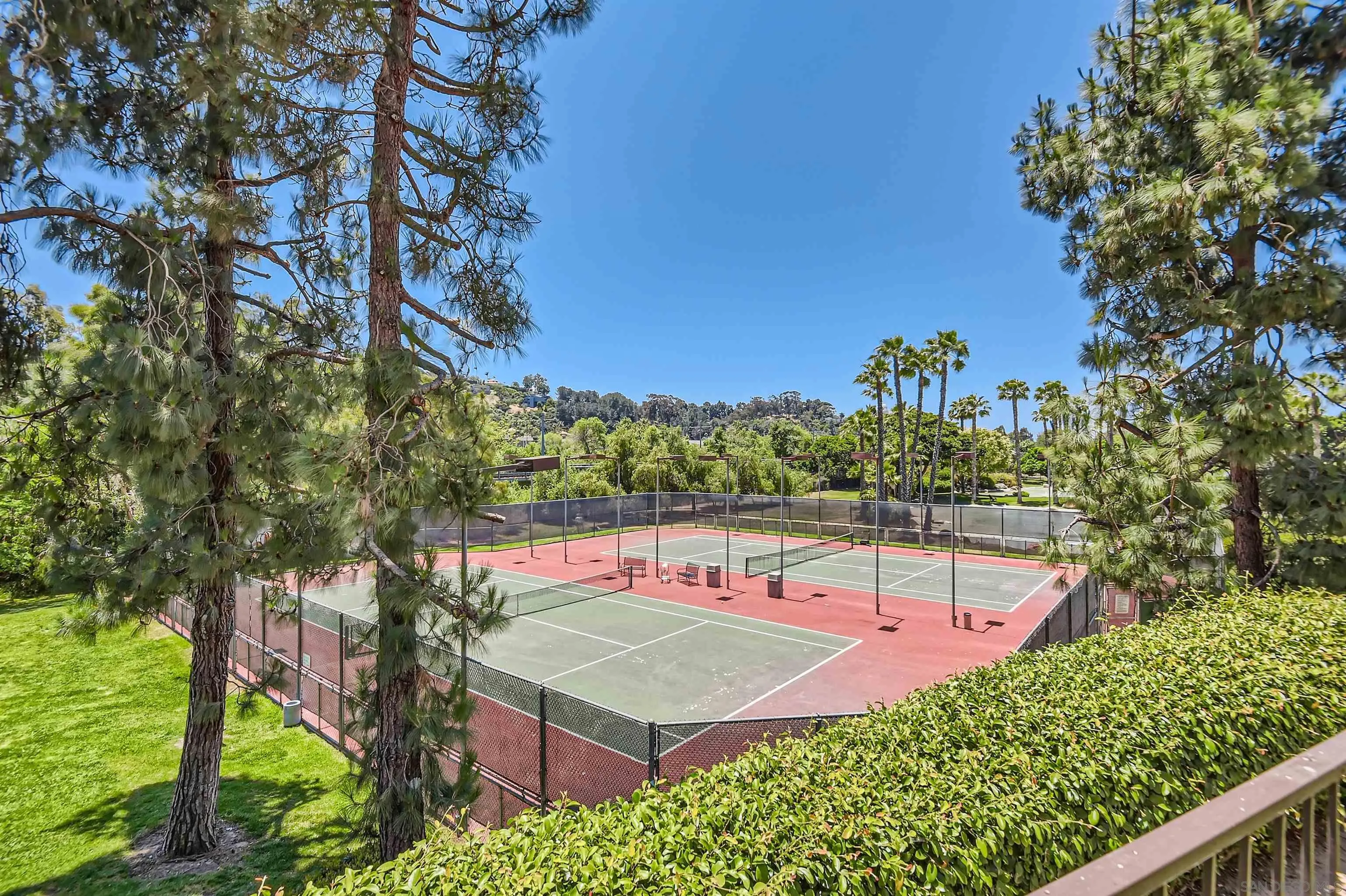 5875 Friars Road, Unit 4309 San Diego, CA 92110 - Photo 23 of 26 a view of a swimming pool with a patio