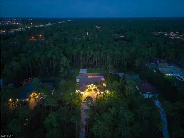 a sunset view with a yard