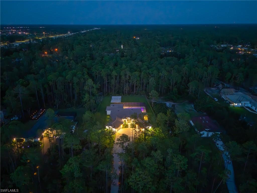 a sunset view with a yard