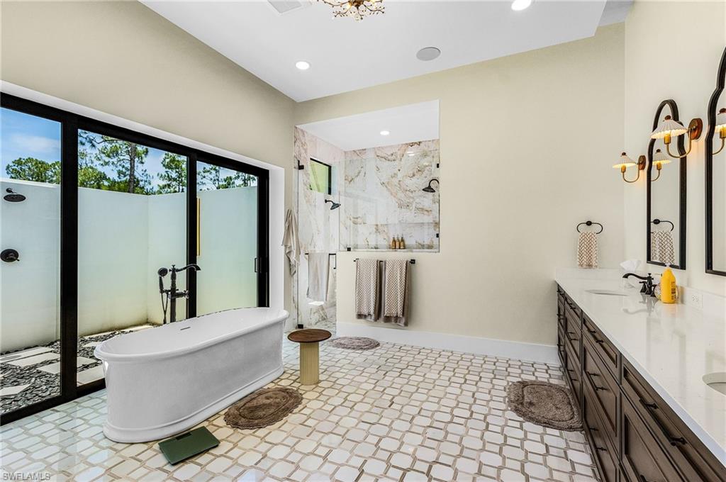 618 31st Street Northwest Naples, FL 34117 - Photo 17 of 47 a living room with a couch and a table