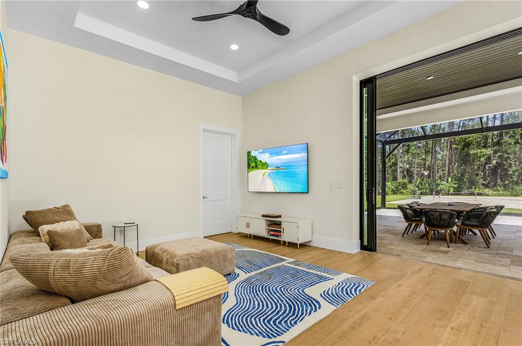 618 31st Street Northwest Naples, FL 34117 - Photo 32 of 47 a bedroom with furniture and a window