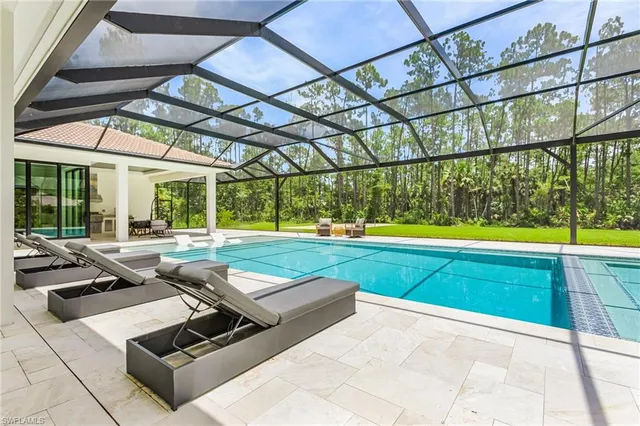 a outdoor space with swimming pool and furniture