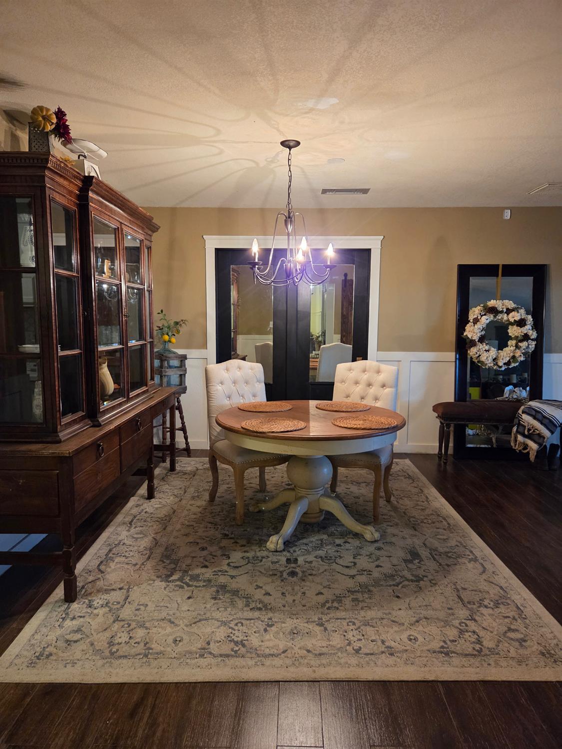 22849 East Jefferson Avenue Reedley, CA 93654 - Photo 12 of 31 a living room with furniture and a rug