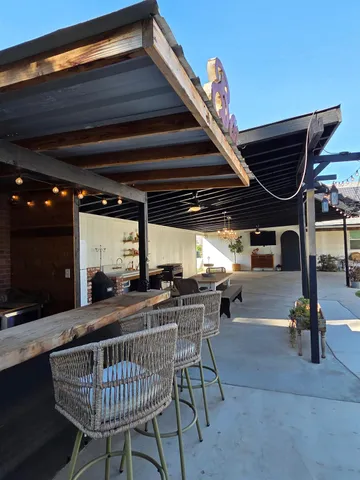 a view of a backyard of white house