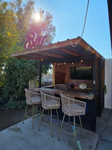 a view of a park with large trees
