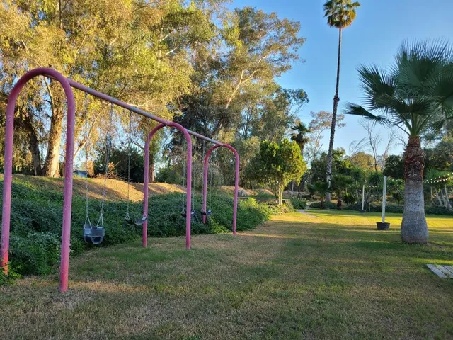 a view of a swimming pool with a patio