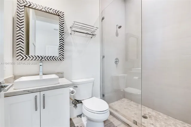 a view of a storage & utility room with washer and dryer